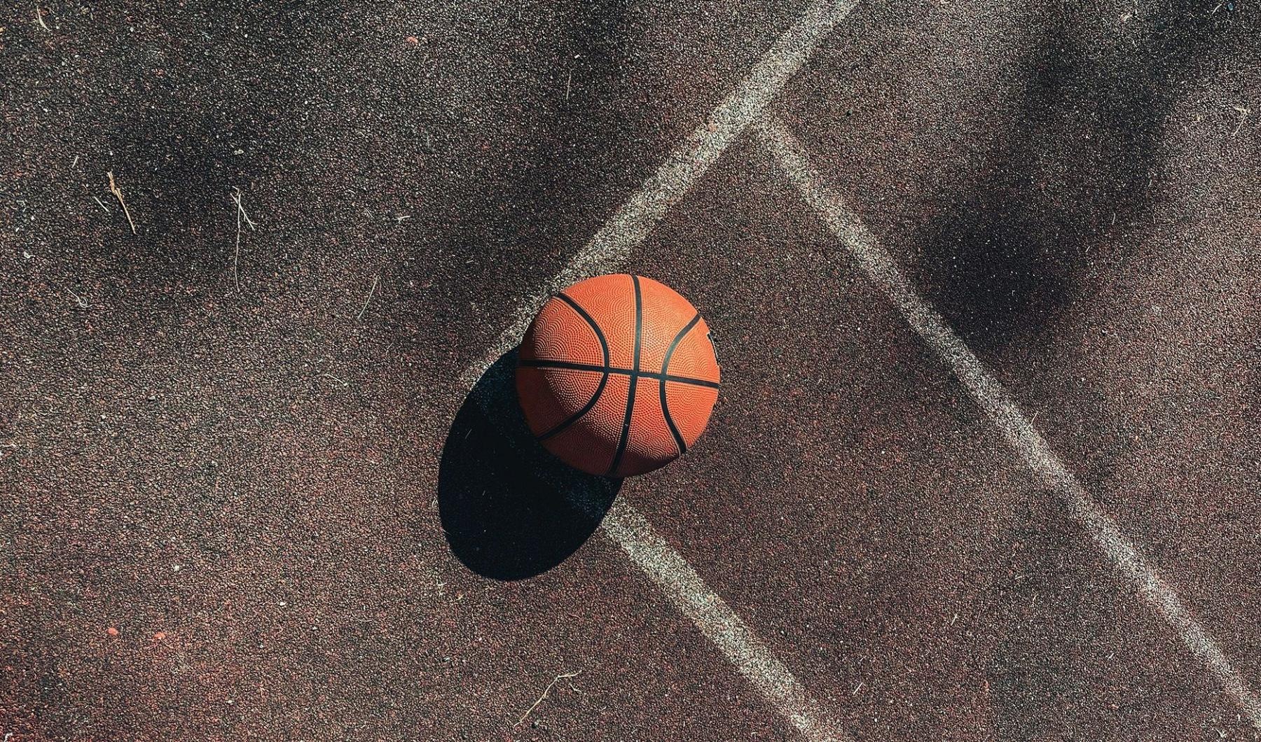 Enjoy your resident amenities a basketball on a basketball court