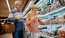 a man and woman grocery shopping